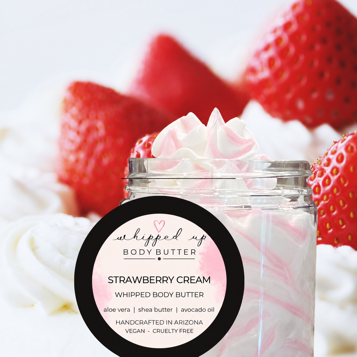 Whipped strawberry cream body butter in a jar, showcasing smooth, fluffy texture and fresh strawberry scent from My Store.