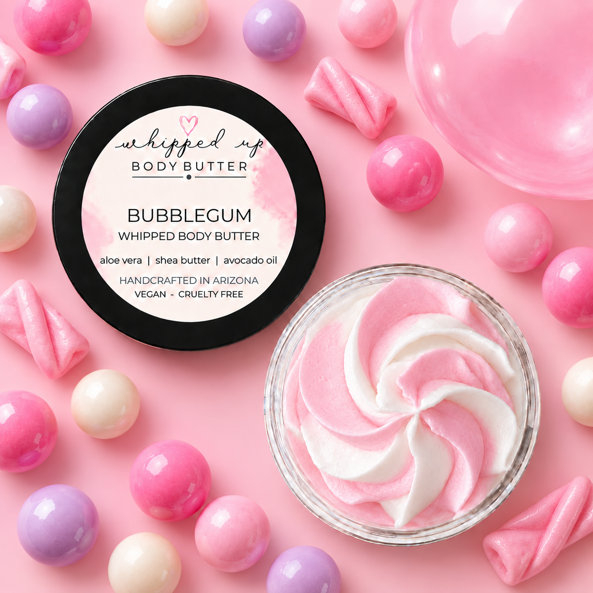 Whipped bubblegum body butter by My Store showing a creamy, pink-scented moisturizer in a jar with a smooth texture.